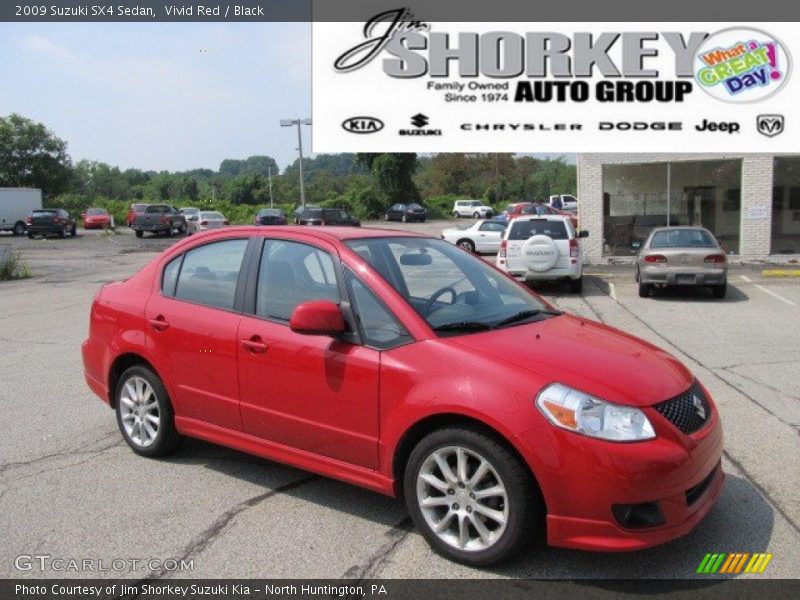 Vivid Red / Black 2009 Suzuki SX4 Sedan