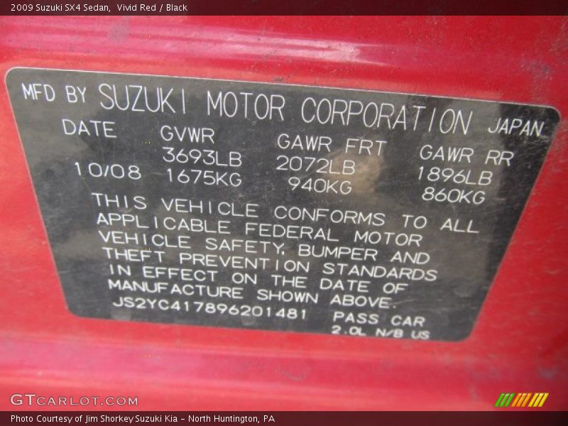 Vivid Red / Black 2009 Suzuki SX4 Sedan