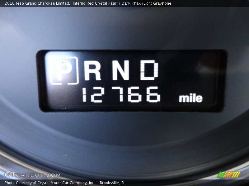Inferno Red Crystal Pearl / Dark Khaki/Light Graystone 2010 Jeep Grand Cherokee Limited