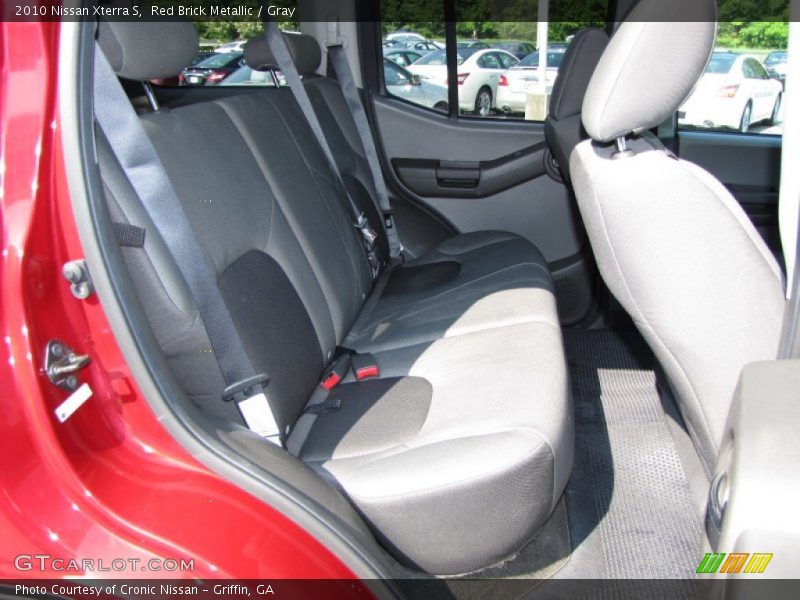 Red Brick Metallic / Gray 2010 Nissan Xterra S