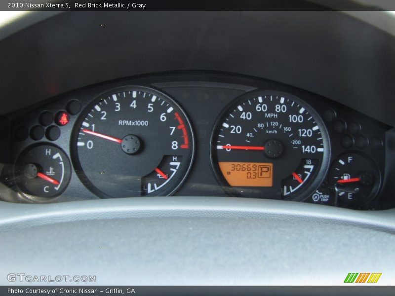 Red Brick Metallic / Gray 2010 Nissan Xterra S