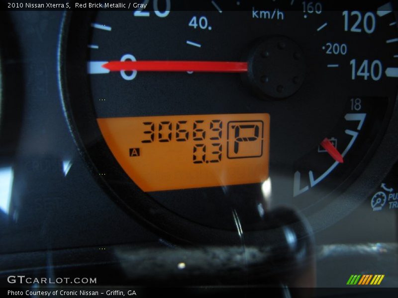 Red Brick Metallic / Gray 2010 Nissan Xterra S