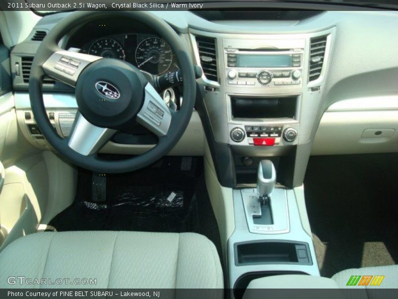 Crystal Black Silica / Warm Ivory 2011 Subaru Outback 2.5i Wagon