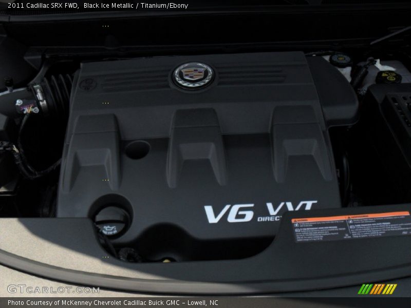 Black Ice Metallic / Titanium/Ebony 2011 Cadillac SRX FWD