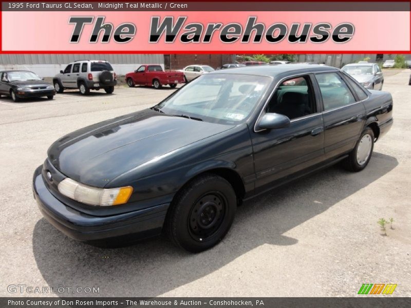 Midnight Teal Metallic / Green 1995 Ford Taurus GL Sedan