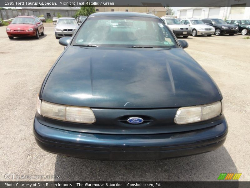 Midnight Teal Metallic / Green 1995 Ford Taurus GL Sedan