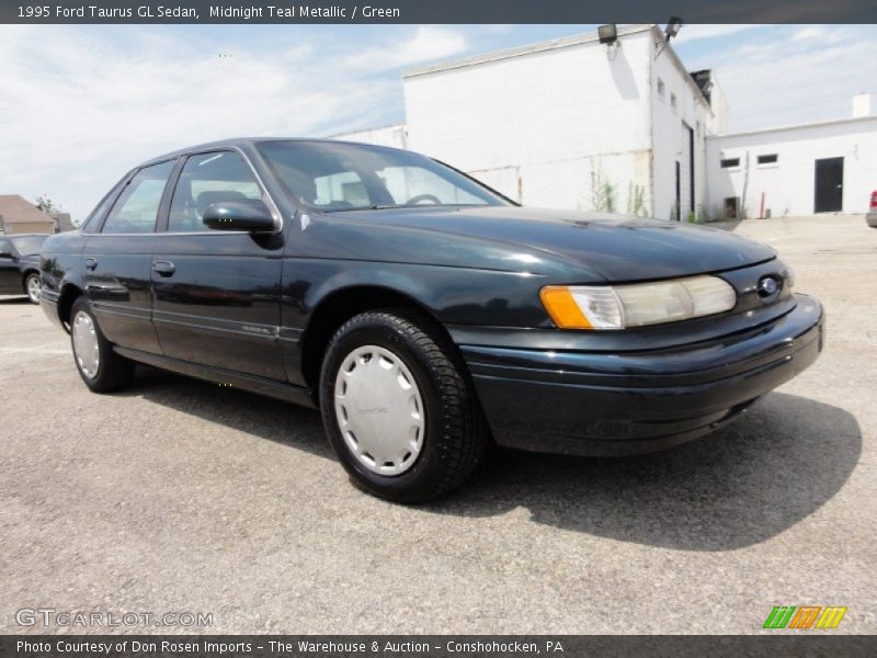 Midnight Teal Metallic / Green 1995 Ford Taurus GL Sedan