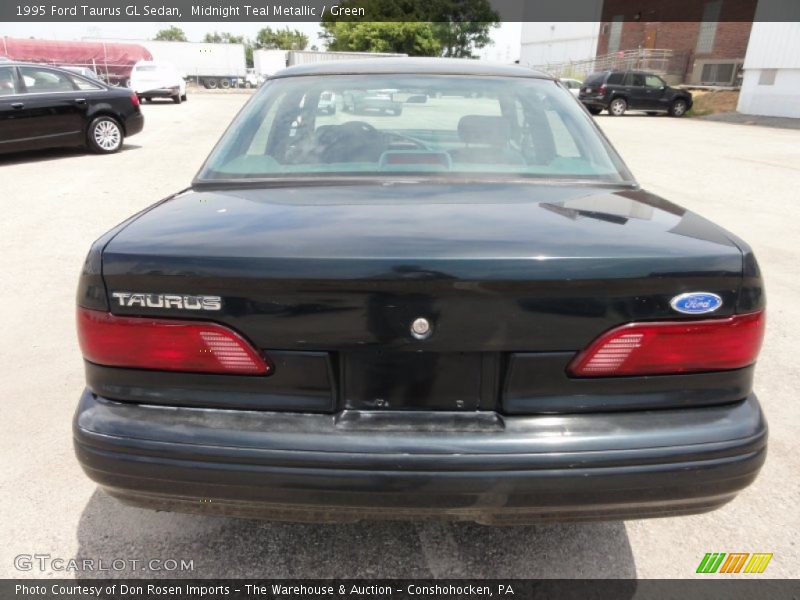 Midnight Teal Metallic / Green 1995 Ford Taurus GL Sedan