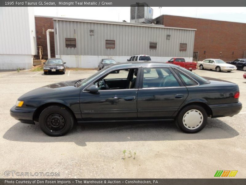 Midnight Teal Metallic / Green 1995 Ford Taurus GL Sedan
