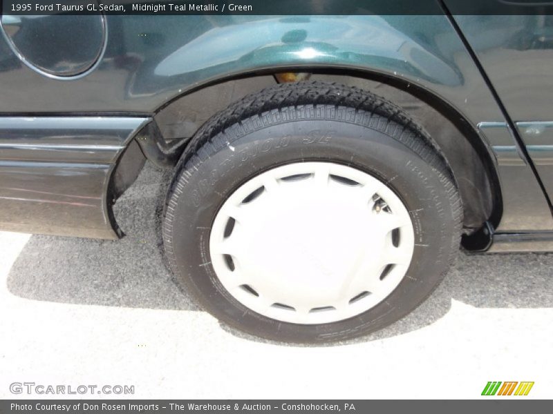 Midnight Teal Metallic / Green 1995 Ford Taurus GL Sedan