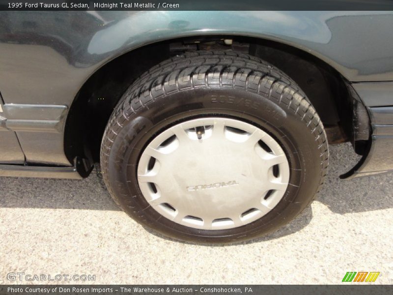 Midnight Teal Metallic / Green 1995 Ford Taurus GL Sedan