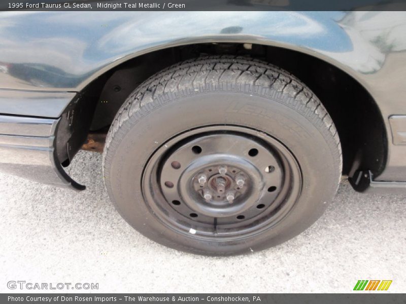 Midnight Teal Metallic / Green 1995 Ford Taurus GL Sedan