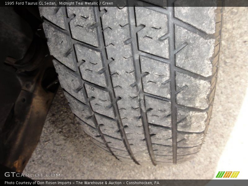 Midnight Teal Metallic / Green 1995 Ford Taurus GL Sedan