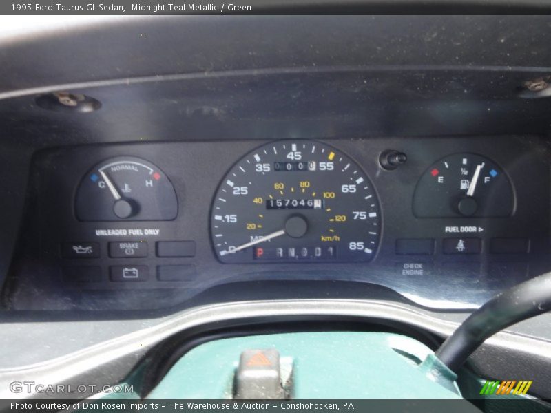 Midnight Teal Metallic / Green 1995 Ford Taurus GL Sedan