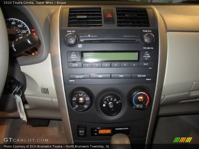 Super White / Bisque 2010 Toyota Corolla