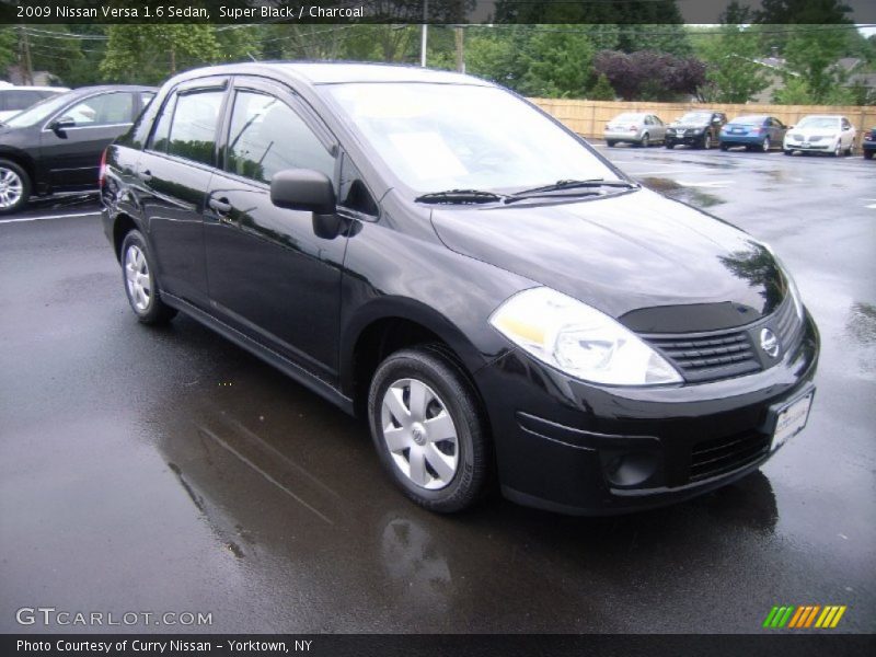 Super Black / Charcoal 2009 Nissan Versa 1.6 Sedan