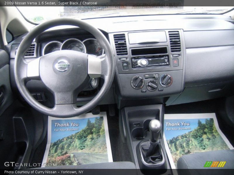 Super Black / Charcoal 2009 Nissan Versa 1.6 Sedan