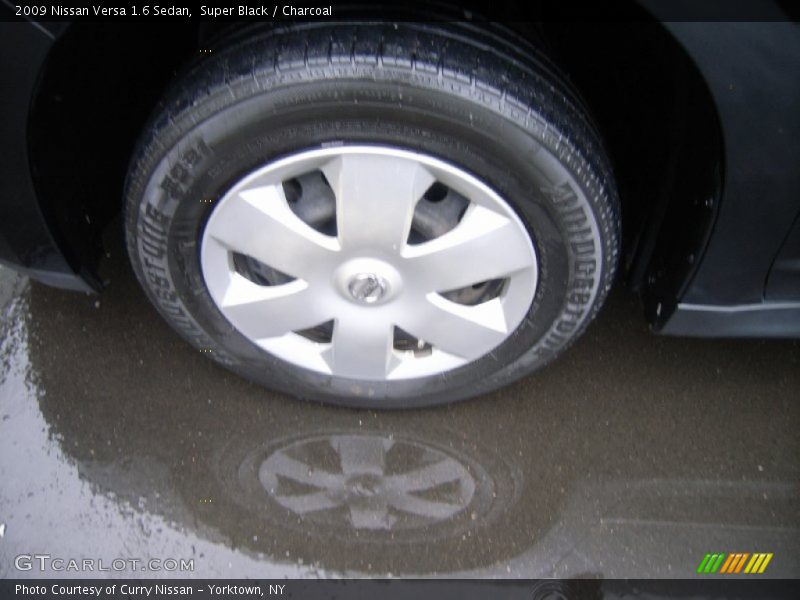 Super Black / Charcoal 2009 Nissan Versa 1.6 Sedan