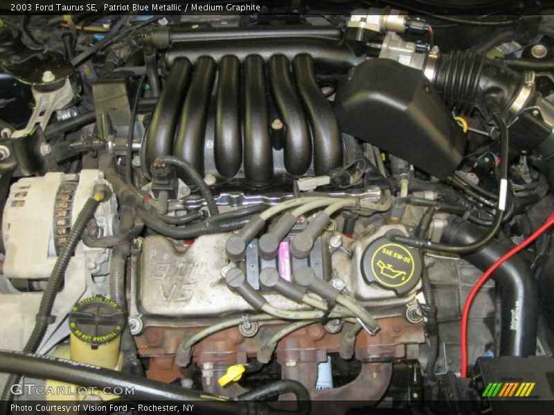 Patriot Blue Metallic / Medium Graphite 2003 Ford Taurus SE