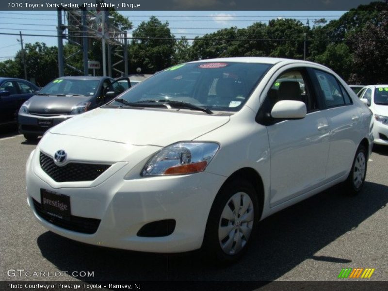 Polar White / Bisque 2010 Toyota Yaris Sedan
