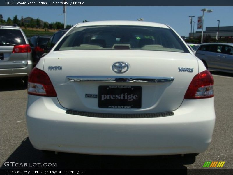 Polar White / Bisque 2010 Toyota Yaris Sedan