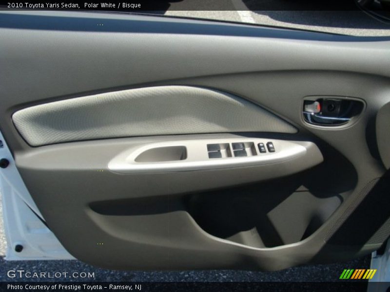 Polar White / Bisque 2010 Toyota Yaris Sedan