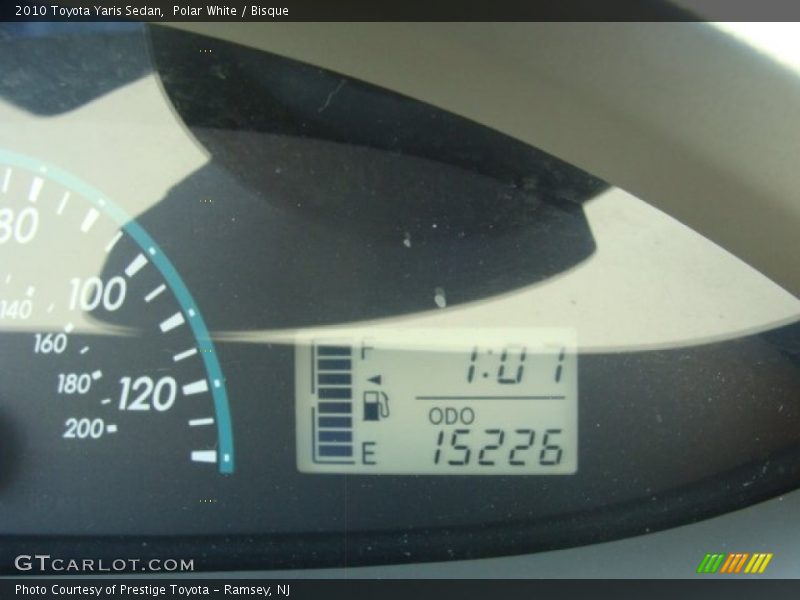 Polar White / Bisque 2010 Toyota Yaris Sedan