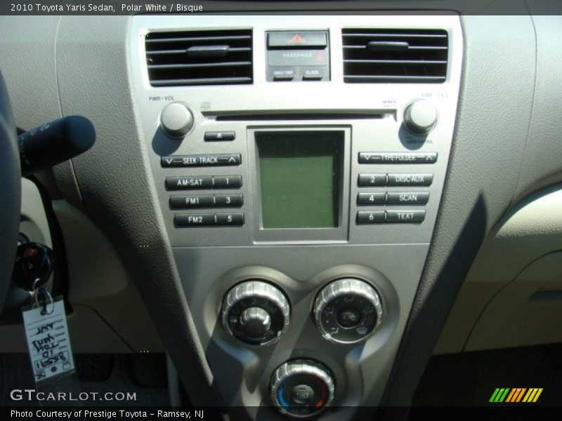 Polar White / Bisque 2010 Toyota Yaris Sedan