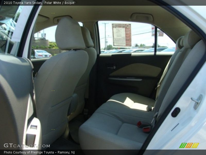 Polar White / Bisque 2010 Toyota Yaris Sedan