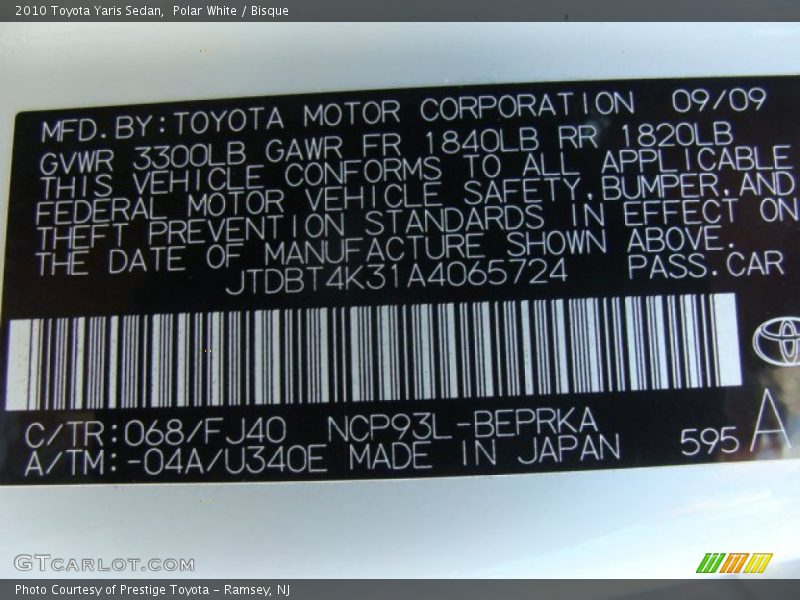 Polar White / Bisque 2010 Toyota Yaris Sedan
