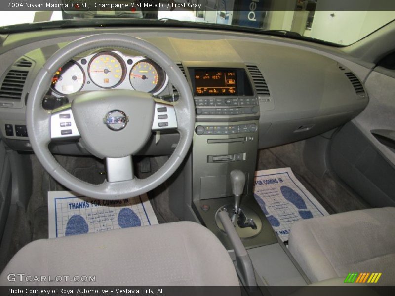 Champagne Mist Metallic / Frost Gray 2004 Nissan Maxima 3.5 SE