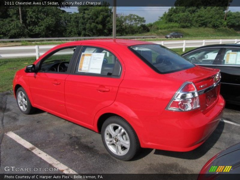 Victory Red / Charcoal 2011 Chevrolet Aveo LT Sedan