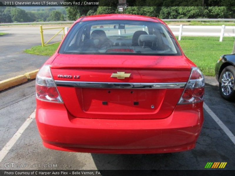 Victory Red / Charcoal 2011 Chevrolet Aveo LT Sedan