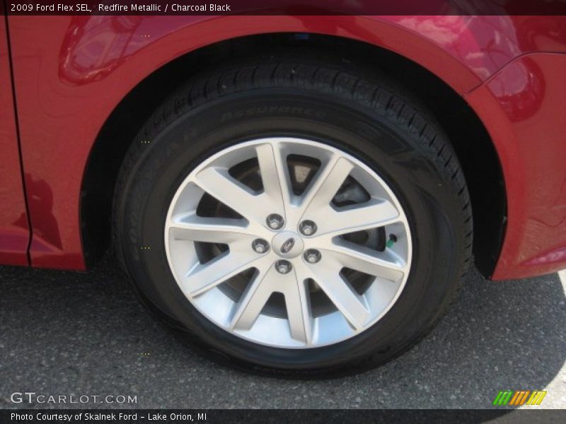Redfire Metallic / Charcoal Black 2009 Ford Flex SEL