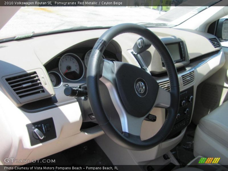 Pomegranate Red Metallic / Ceylon Beige 2010 Volkswagen Routan SE