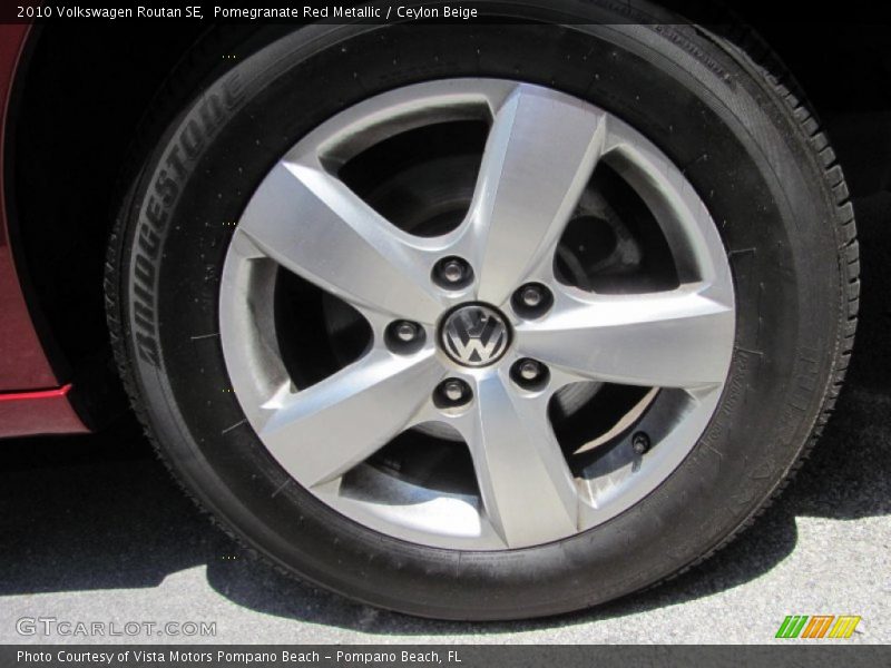 Pomegranate Red Metallic / Ceylon Beige 2010 Volkswagen Routan SE