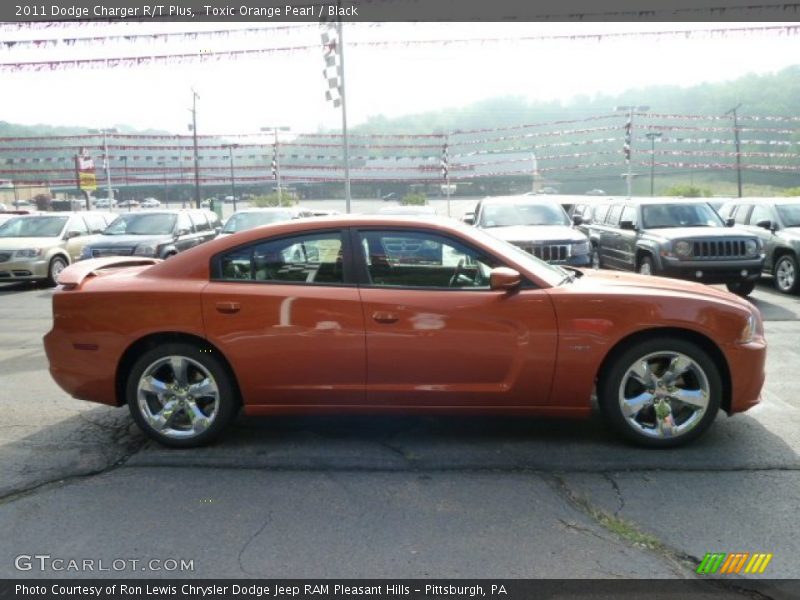 Toxic Orange Pearl / Black 2011 Dodge Charger R/T Plus