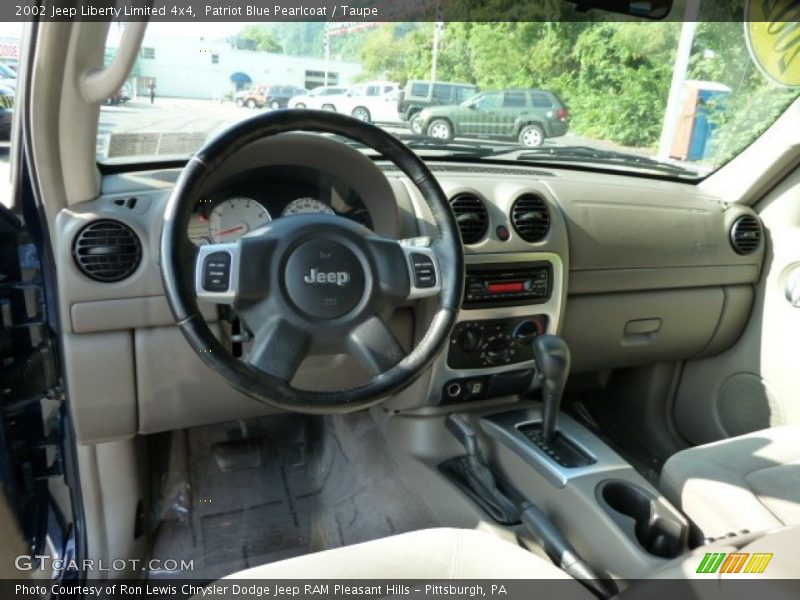 Patriot Blue Pearlcoat / Taupe 2002 Jeep Liberty Limited 4x4