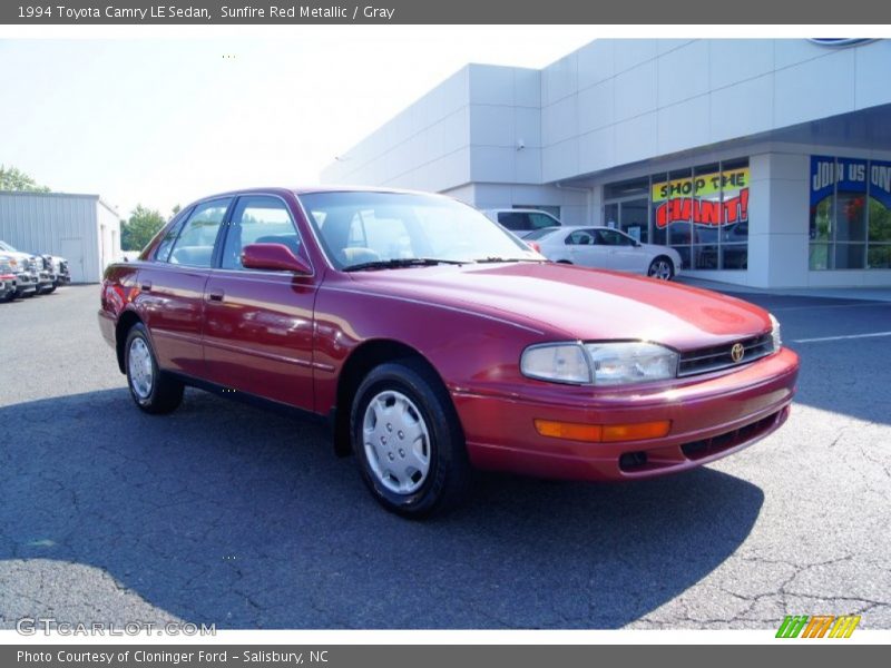 Sunfire Red Metallic / Gray 1994 Toyota Camry LE Sedan