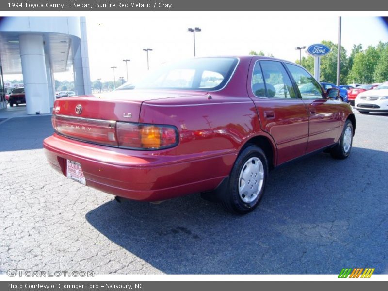Sunfire Red Metallic / Gray 1994 Toyota Camry LE Sedan