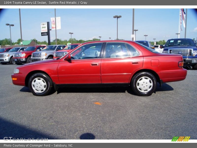 Sunfire Red Metallic / Gray 1994 Toyota Camry LE Sedan