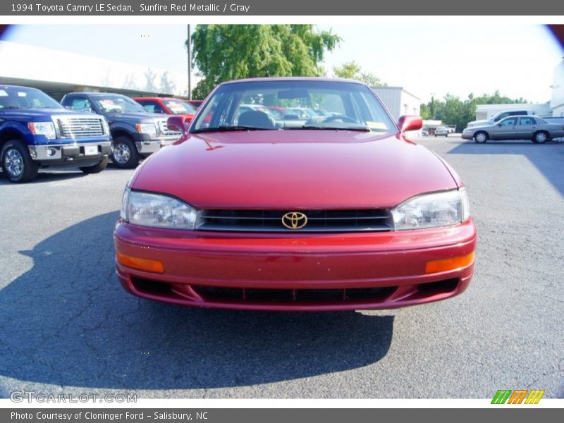 Sunfire Red Metallic / Gray 1994 Toyota Camry LE Sedan