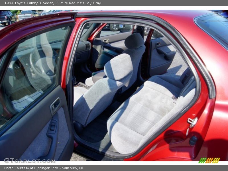 Sunfire Red Metallic / Gray 1994 Toyota Camry LE Sedan