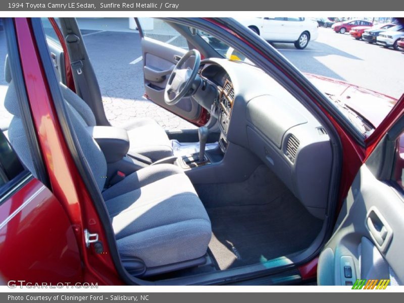 Sunfire Red Metallic / Gray 1994 Toyota Camry LE Sedan