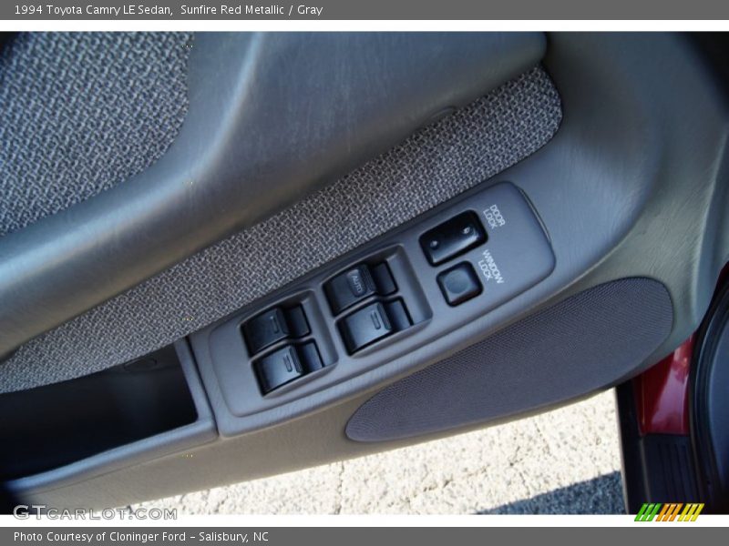 Sunfire Red Metallic / Gray 1994 Toyota Camry LE Sedan