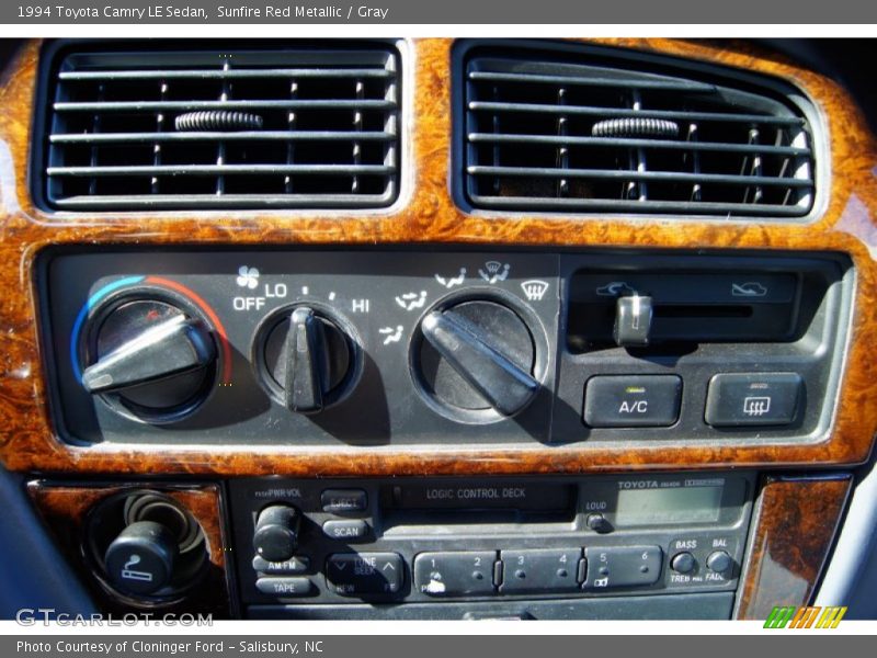 Sunfire Red Metallic / Gray 1994 Toyota Camry LE Sedan