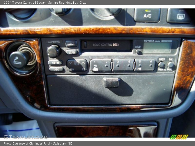 Sunfire Red Metallic / Gray 1994 Toyota Camry LE Sedan