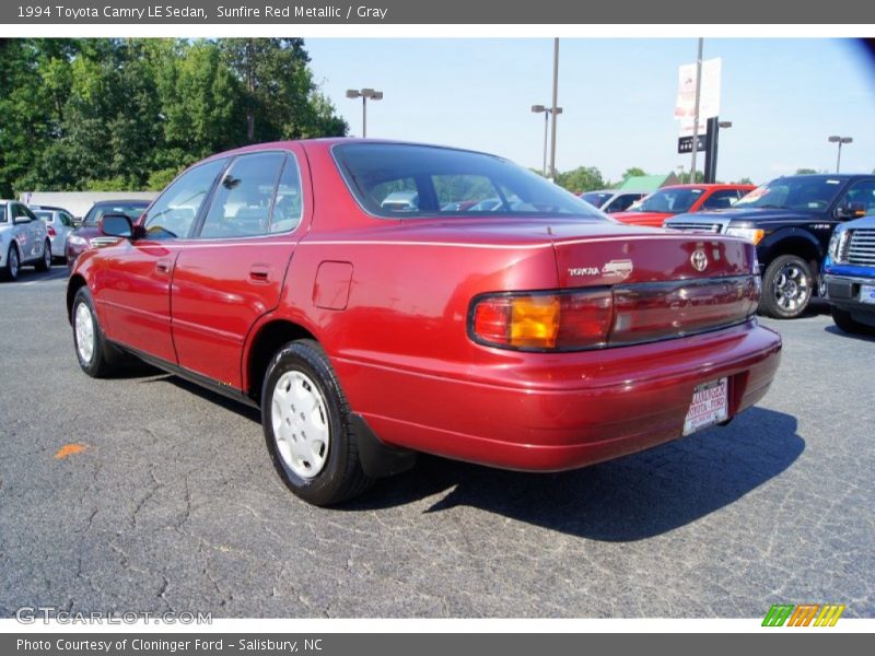 Sunfire Red Metallic / Gray 1994 Toyota Camry LE Sedan