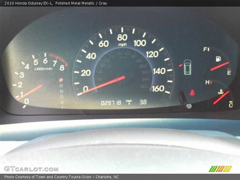 Polished Metal Metallic / Gray 2010 Honda Odyssey EX-L