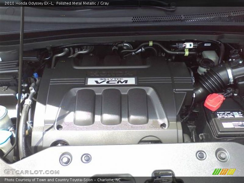 Polished Metal Metallic / Gray 2010 Honda Odyssey EX-L